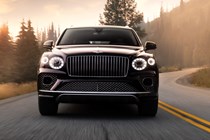 Bentley Bentayga EWB review - dead-on front view, purple, driving