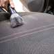 Using a carpet cleaner on a fabric car seat