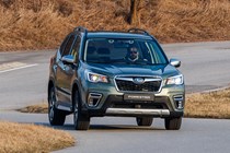 Subaru Forester (2022) review - front cornering shot, green car, body roll