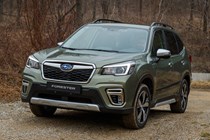 Subaru Forester (2022) review - front static, halfway up an off-road hill, green car