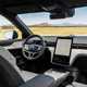 Volvo EX90 review: dashboard, infotainment system and front seats, grey fabric upholstery