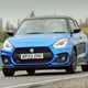 Suzuki Swift Sport (2023) review: front driving shot, blue car, British B-road