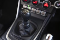 Toyota GR86 review: manual gear shifter, black upholstery