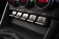 Toyota GR86 review: climate control panel, black trim, silver switches
