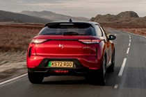 DS 3 E-Tense (2023) review: rear three quarter tracking, red car, parched background