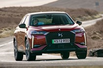 DS 3 E-Tense (2023) review: front cornering, red car, parched background