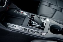 DS 3 E-Tense (2023) review: centre console, window switches and gear selector, black upholstery