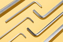 Allen Wrench Neatly Arranged on Yellow Background