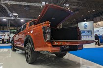 2023 Isuzu D-Max, rear three quarter static, orange paint