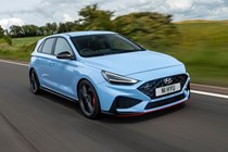 2023 Hyundai i30 N hatchback driving on a straight road. Photo taken from a tracking car..