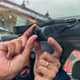 Image of a man putting a dash cam in position