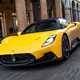 Maserati MC20 (2025) review: front three quarter driving, yellow paint