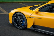 Maserati MC20 (2025) review: alloy wheel and front quarter panel, yellow paint
