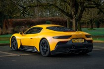 Maserati MC20 (2025) review: rear three quarter static, yellow paint