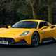 Maserati MC20 (2025) review: front three quarter static, yellow paint