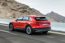 Audi E-Tron in red rear driving shot