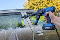 Draper D20 cordless pressure washer in use