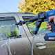 Draper D20 cordless pressure washer in use