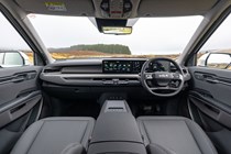 Kia EV9 review (2024): dashboard and infotainment system, grey and black upholstery