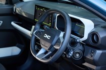 Dacia Spring review - digital instruments and steering wheel