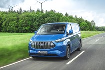 Ford e-Transit Custom: front three quarter driving, blue paint