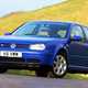 Volkswagen Golf Mk4 review: front three quarter static, blue paint, fields in background
