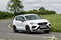 Cupra Ateca review - facelift, side view, white, driving round corner