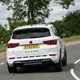 Cupra Ateca review - facelift, rear view, white, driving round corner