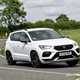Cupra Ateca review - facelift, side view, white, driving round corner