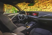 Vauxhall Astra Sports Tourer Electric (2023) review: dashboard, infotainment system and front seats, black fabric upholstery
