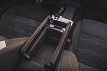 Vauxhall Astra Sports Tourer Electric (2023) review: central armrest storage bin, black upholstery