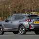 Subaru Crosstrek review (2024): rear three quarter static, grey paint
