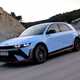 Hyundai Ioniq 5 N (2024) review: front three quarter driving, on track, matte blue paint, Spanish roads