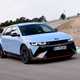 Hyundai Ioniq 5 N (2024) review: front three quarter cornering, on track, matte blue paint, Spanish roads