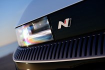 Hyundai Ioniq 5 N (2024) review: LED headlight detail shot, matte blue paint