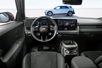Hyundai Ioniq 5 N (2024) review: dashboard and infotainment system, black upholstery