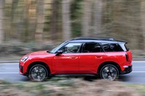 Mini Countryman Cooper SE in red, side profile
