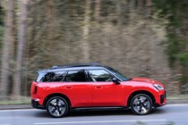 Mini Countryman Cooper SE in red, side profile