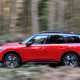 Mini Countryman Cooper SE in red, side profile