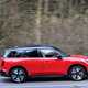 Mini Countryman Cooper SE in red, side profile