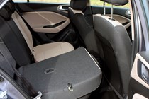 Hyundai i20 Hatchback (2015-) - UK rhd model, interior detail - rear passenger seats with one seat lowered
