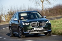 Most economical SUVs: BMW X1, front three quarter cornering, green paint