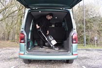 The Hoover HL5 vacuum being used with a van