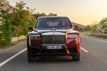 Rolls-Royce Cullinan (2024) review: front driving, red paint