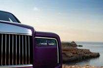 Rolls-Royce Cullinan (2024) review: LED headlight detail shot, purple paint