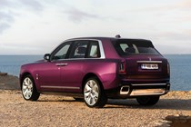 Rolls-Royce Cullinan (2024) review: rear three quarter static, purple paint