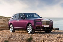 Rolls-Royce Cullinan (2024) review: front three quarter static, low angle, purple paint