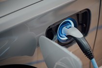 White EV plugged in to recharge - Best EV tariffs