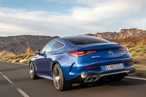 Mercedes-AMG CLE 53 review: rear three quarter driving, low angle, blue paint