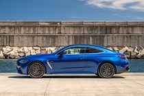 Mercedes-AMG CLE 53 review: side view static, low angle, blue paint